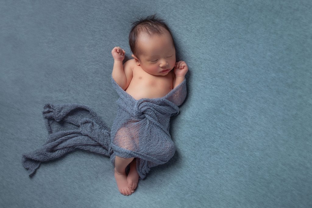 arms up swaddling