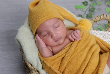 arms up swaddling