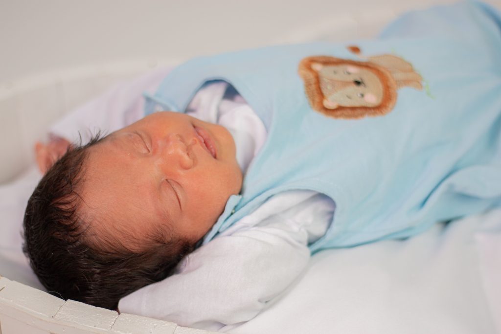 arms up swaddling